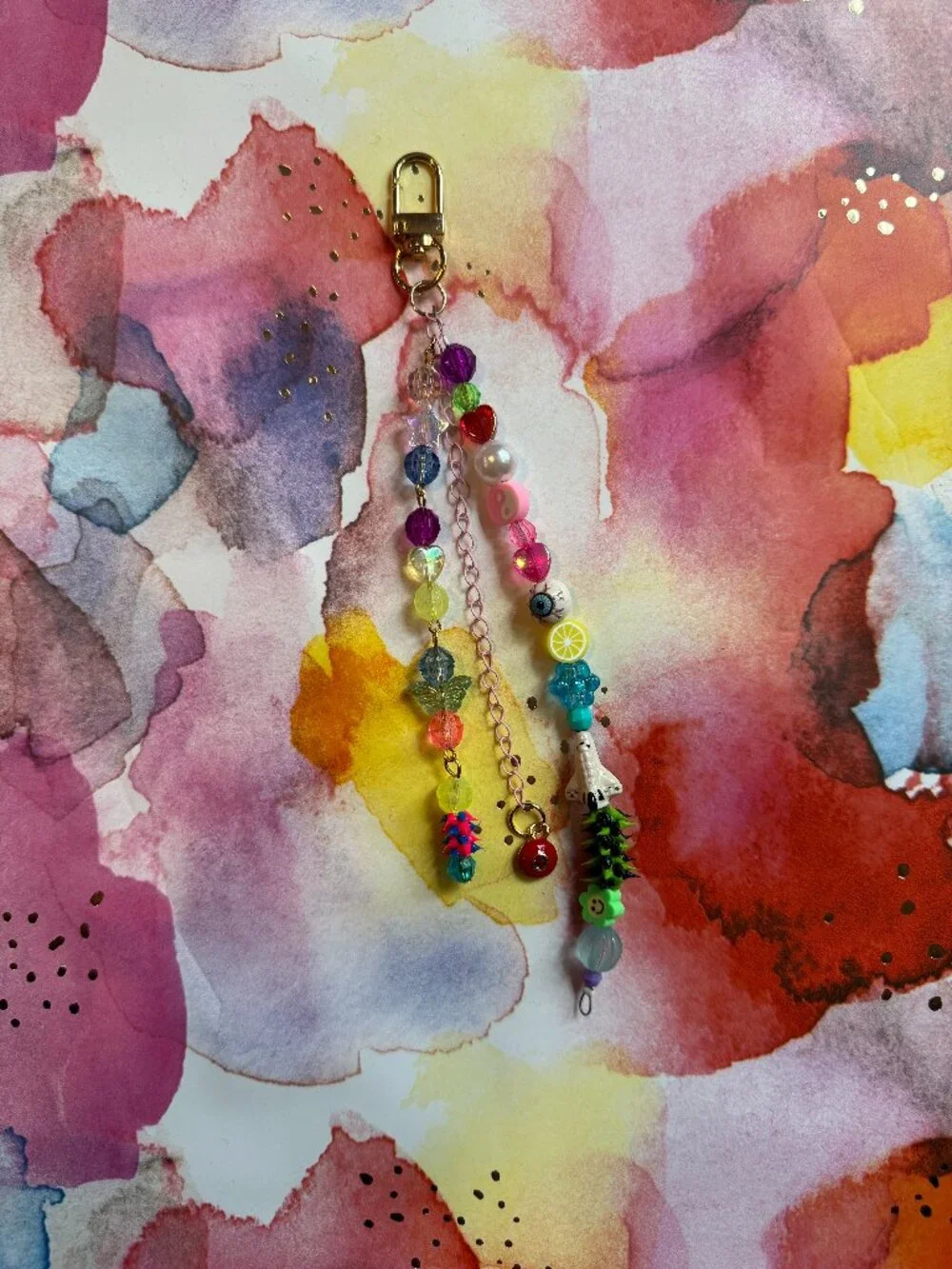 THE LIBRA RED MAGIC EYE BAG CHARM